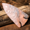 Handcrafted flintknapped Deep Notch Lost Lake spear point made from Flint Ridge Flint by Joel Robinson featuring soft pink, cream, and pale gray natural coloration.
